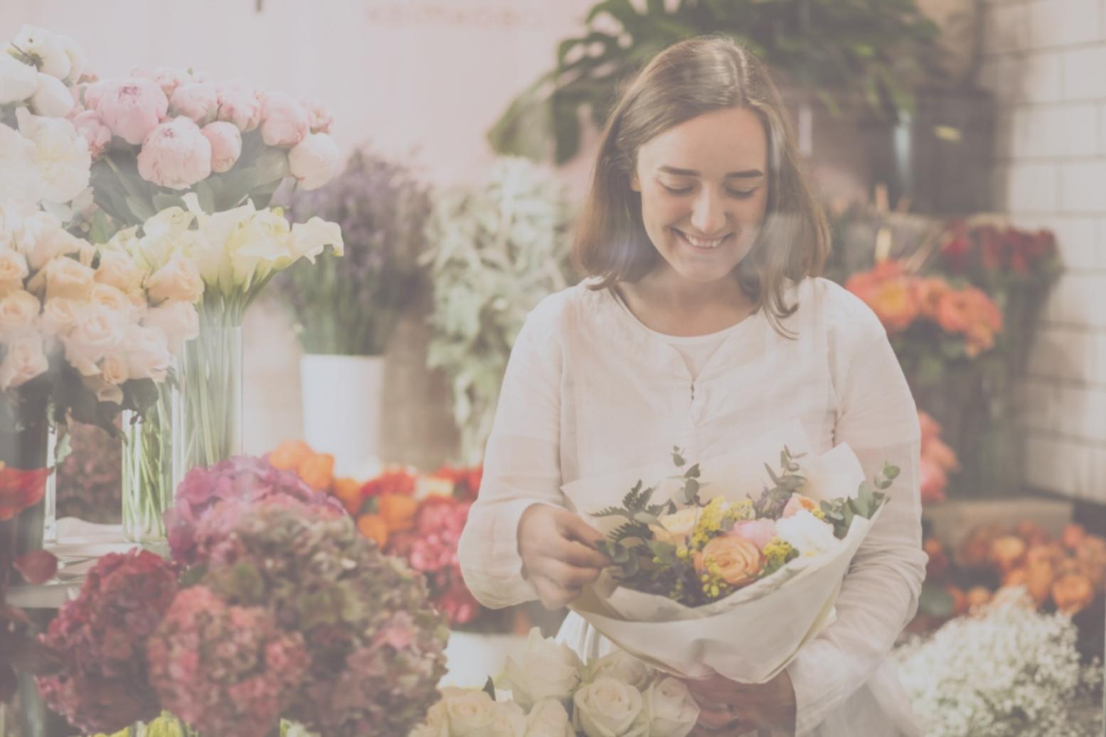 Student reviewing floristry feedback online